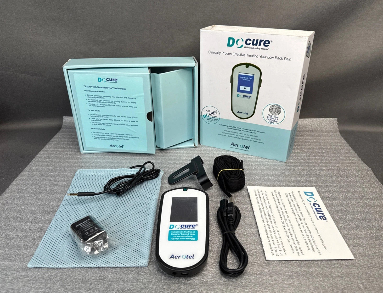 All accessories of DCcure PEMF kit charger, therapeutic pad, user manual, clip